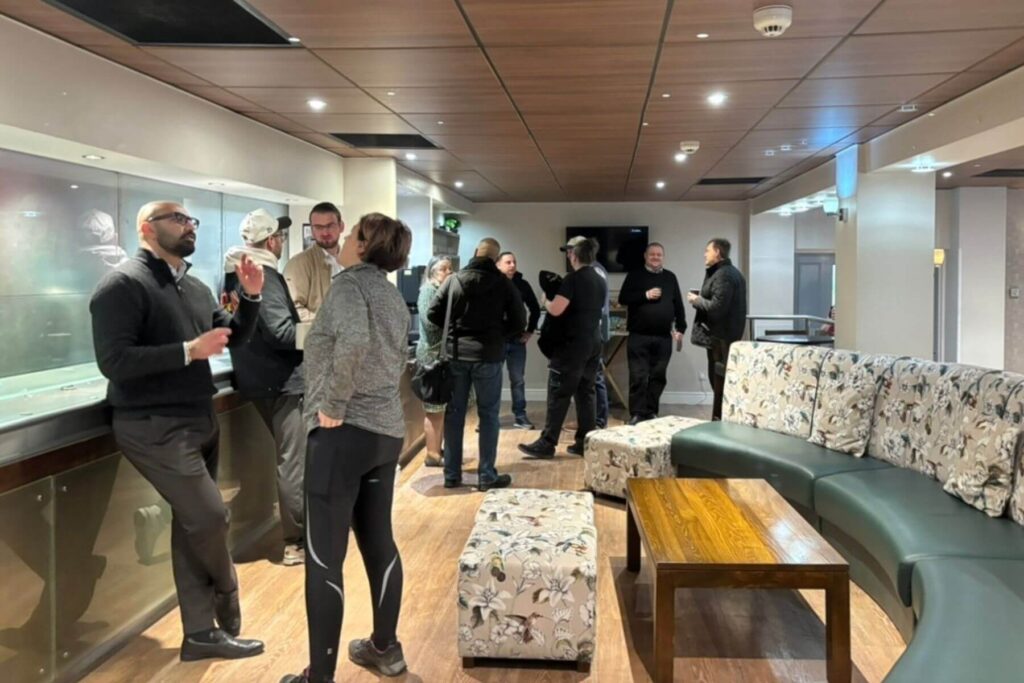 Professionals connecting at a local business networking event
