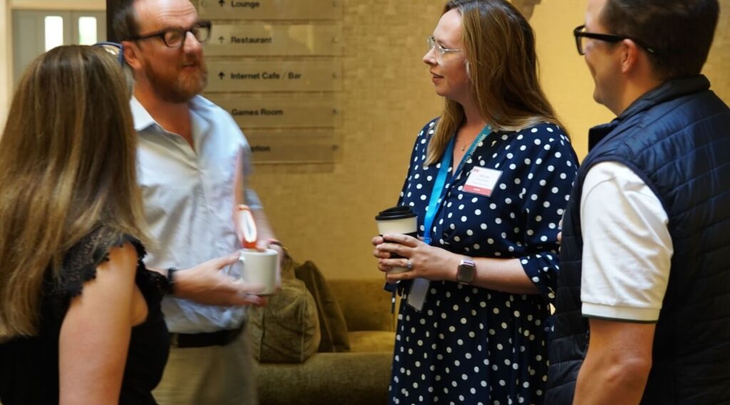 BNI Members chatting during open networking